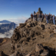 A group of researchers stand outside El Roque de Los Muchachos Observatory on La Palma, Canary Islands.