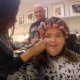 A still image from a video in which theater instructor Robert Dirden and senior design tech major Kristen Sarasien transform Bill Jenkins, chair of the Department of Theatre and Dance, into Edna Turnblad for Ball State’s production of “Hairspray.”