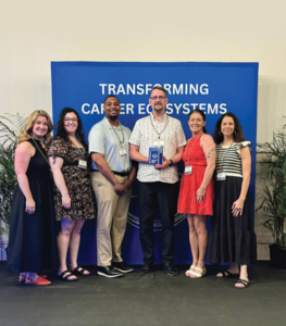 Left to right: Jill Cooper; Katelynn Brady, '20 MA '21, Allen Johnson JR., MA'24; Jim McAtee; Jennifer Welch, '25; and Kyndra Haggard, '07 MA'16
