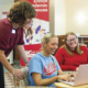 Melisa Stevens and students sitting in student success hub