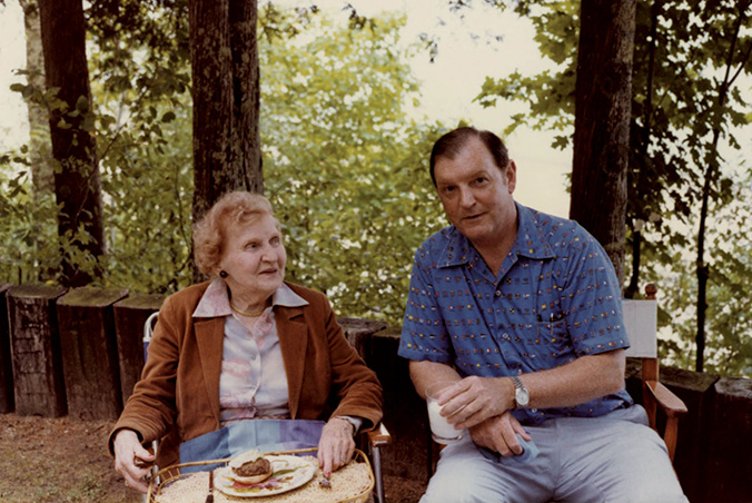 David Owsley and Lucy Ball sitting outside