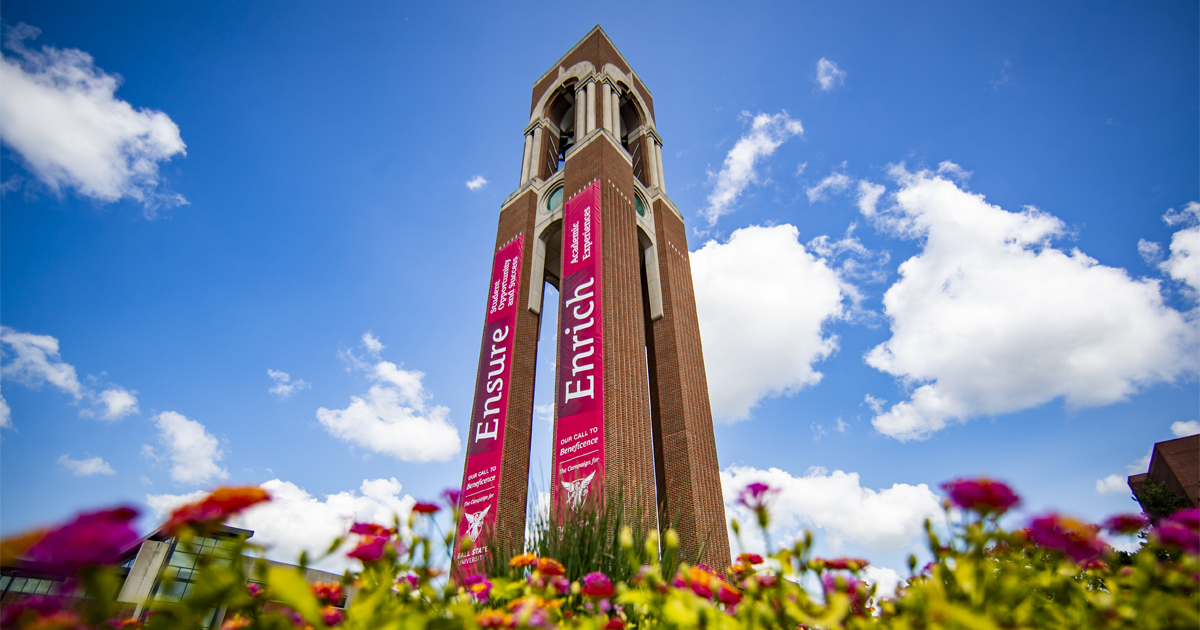 Shafter tower with Spring flowers and a bright blue sky