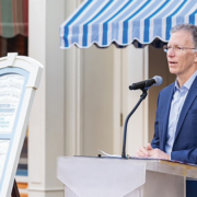 Kevin Lansberry in front of shop window at Disney